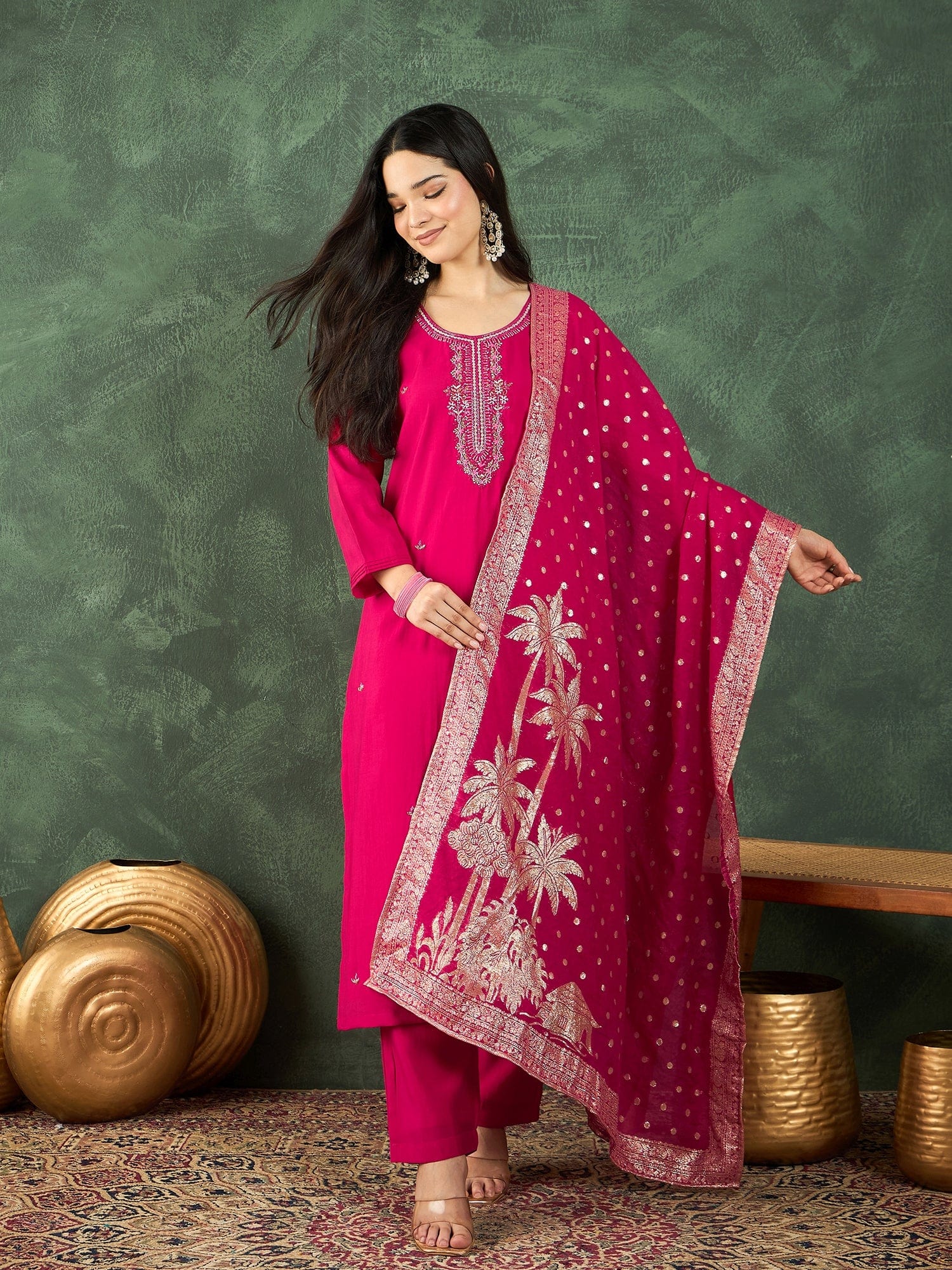 Fuchsia kurta set featuring a bead-embellished yoke, solid ankle-length trousers, and a brocade dupatta