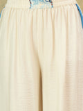 Off-white printed co-ord set featuring a sleeveless V-neck top and relaxed palazzo trousers for a chic, casual look
