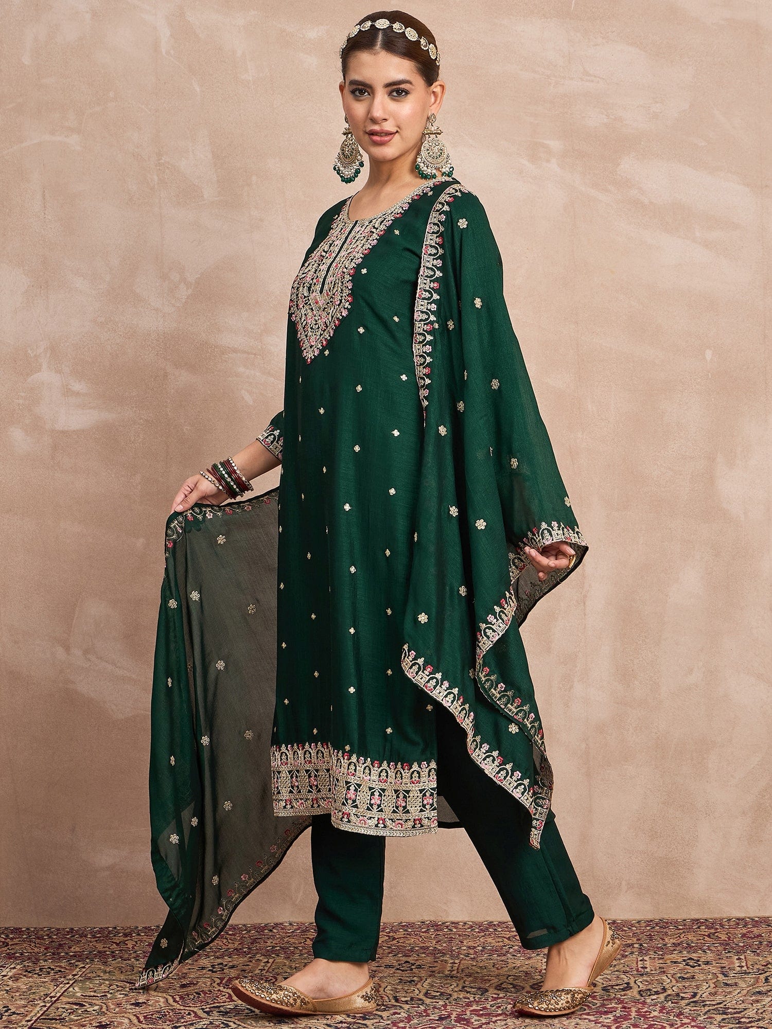 Elegant In Deep Green, This Straight-Fit Kurta With Intricate Zari-Embroidered Yoke Is Paired With Ankle-Length Solid Trousers And A Matching Zari-Accented Dupatta