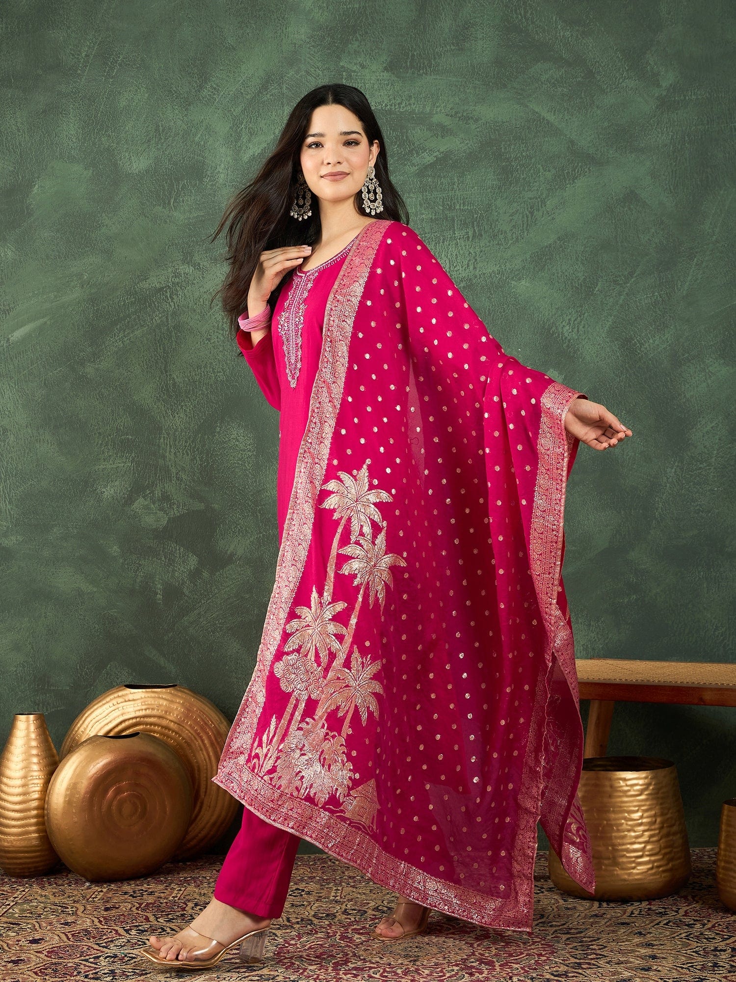 Fuchsia kurta set featuring a bead-embellished yoke, solid ankle-length trousers, and a brocade dupatta