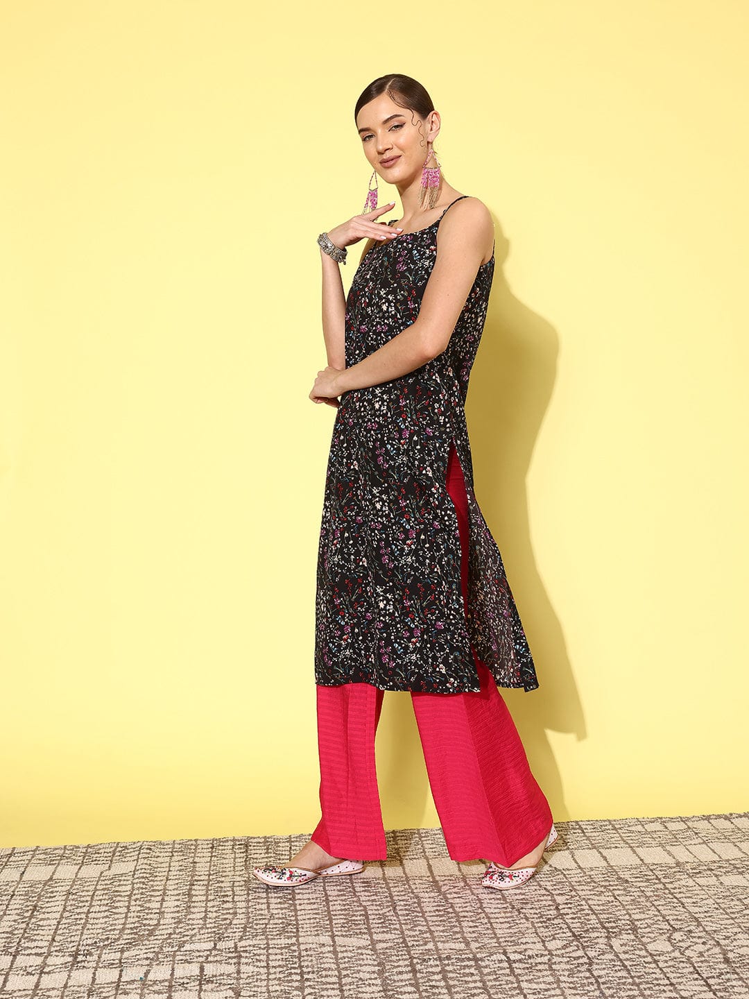 Black floral printed spaghetti strap style straight kurta with side slits