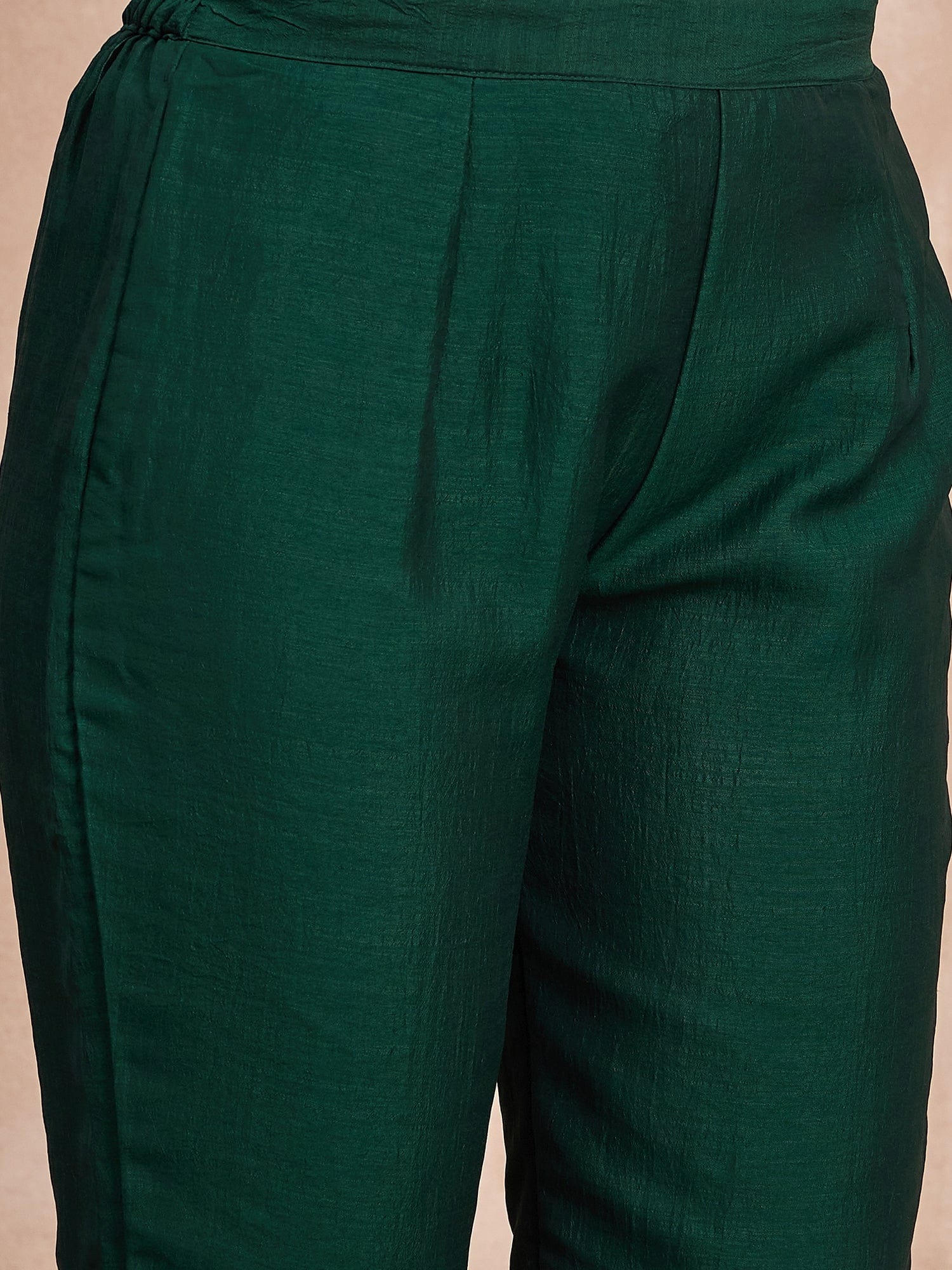 Elegant In Deep Green, This Straight-Fit Kurta With Intricate Zari-Embroidered Yoke Is Paired With Ankle-Length Solid Trousers And A Matching Zari-Accented Dupatta