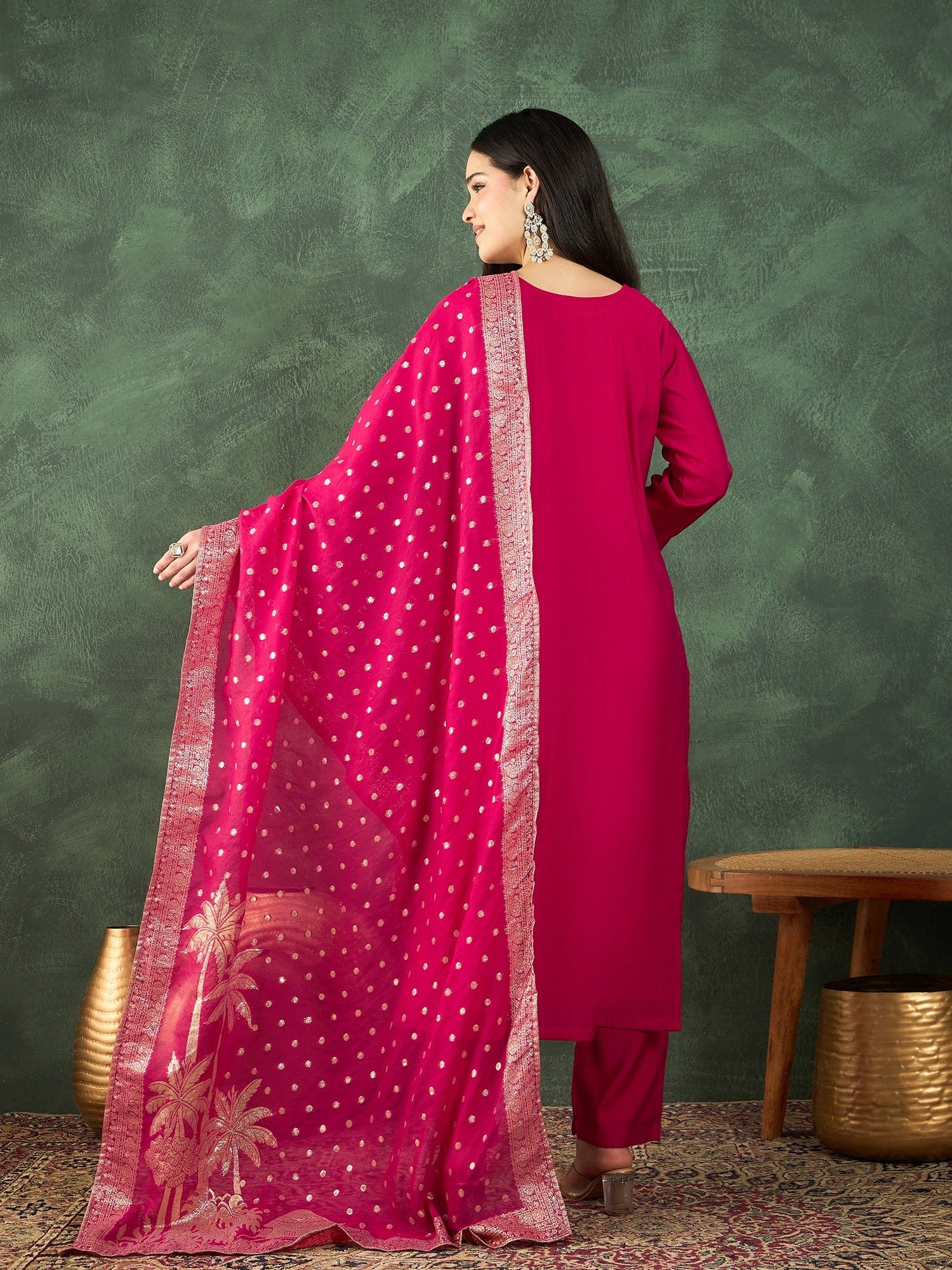 Fuchsia kurta set featuring a bead-embellished yoke, solid ankle-length trousers, and a brocade dupatta