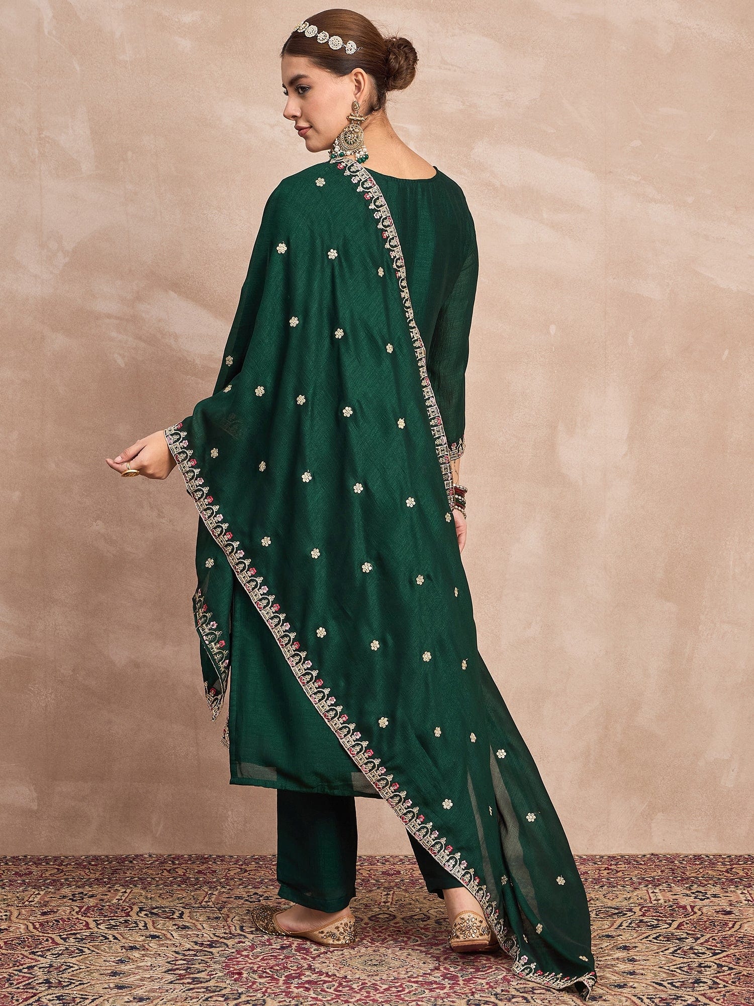 Elegant In Deep Green, This Straight-Fit Kurta With Intricate Zari-Embroidered Yoke Is Paired With Ankle-Length Solid Trousers And A Matching Zari-Accented Dupatta