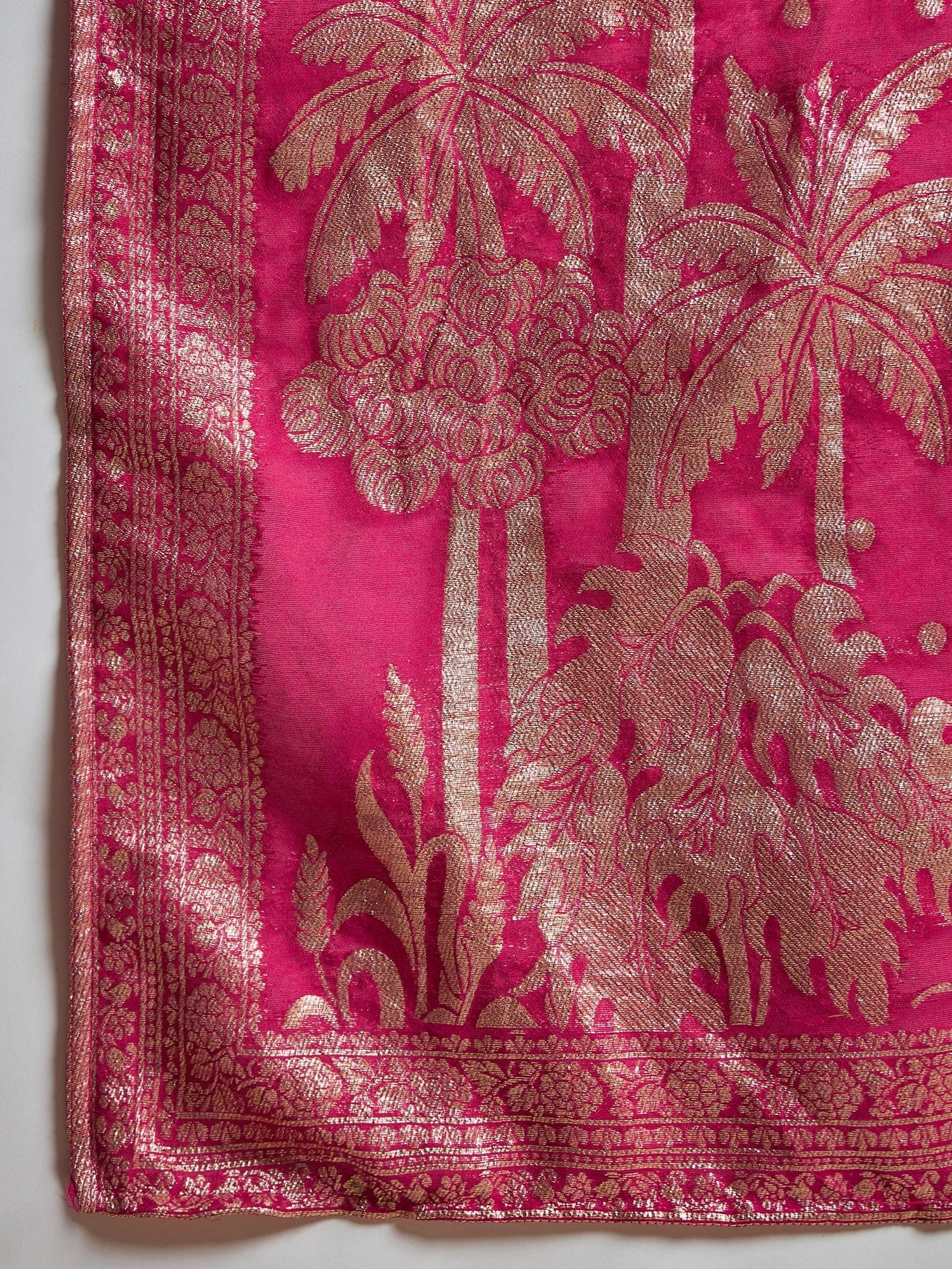 Fuchsia kurta set featuring a bead-embellished yoke, solid ankle-length trousers, and a brocade dupatta