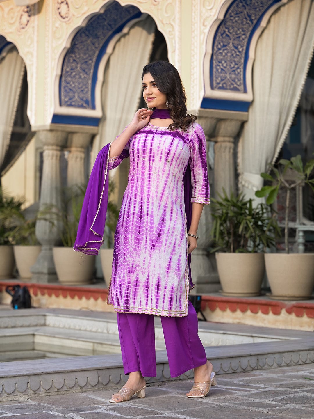 Varanga straight kurta with round neck paired with blue solid palazzo and blue solid dupatta.