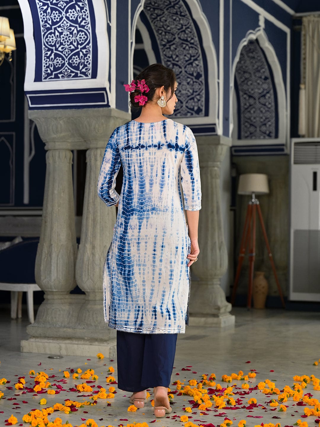 Varanga straight kurta with round neck paired with blue solid palazzo and blue solid dupatta.