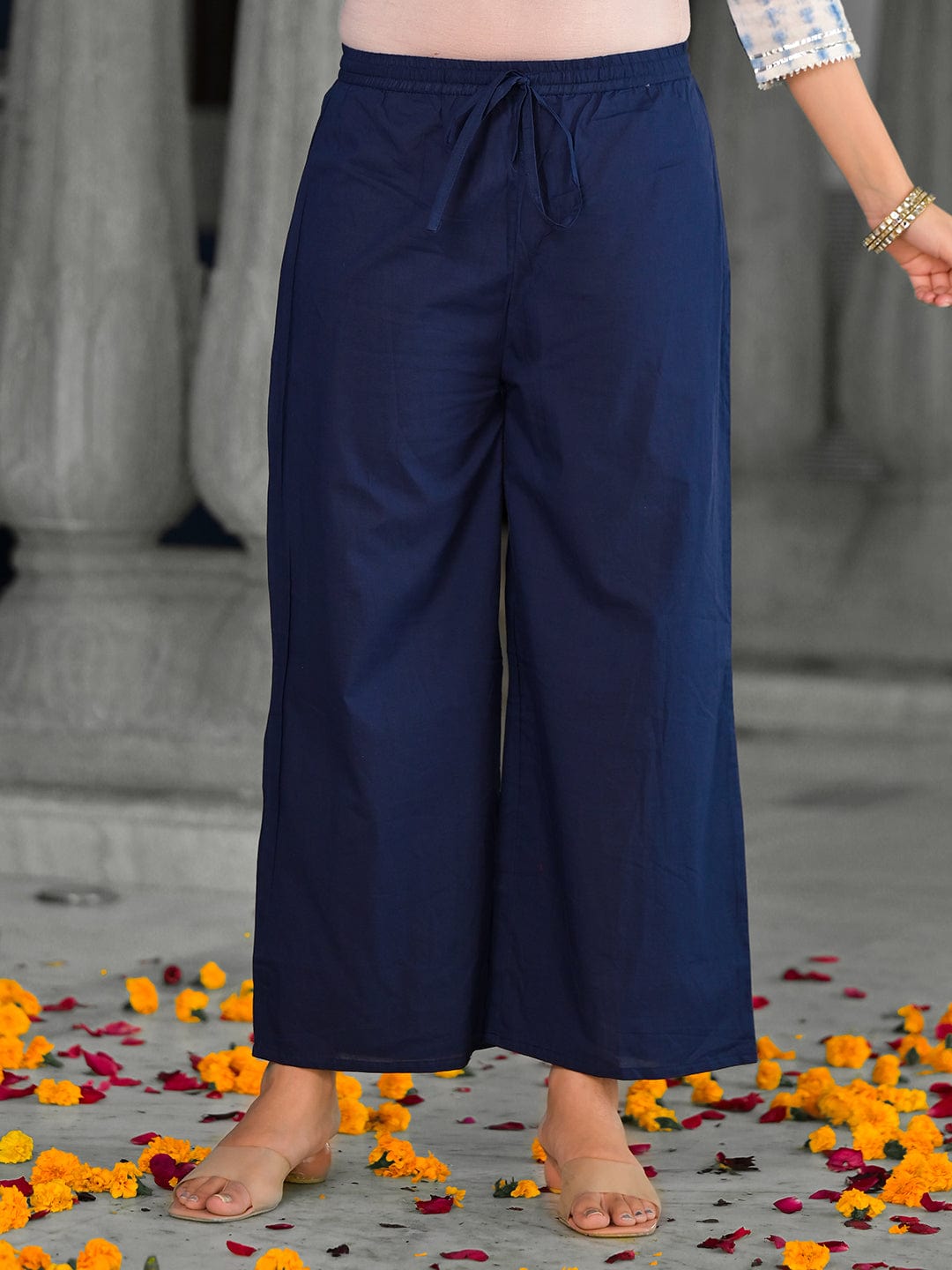 Varanga straight kurta with round neck paired with blue solid palazzo and blue solid dupatta.