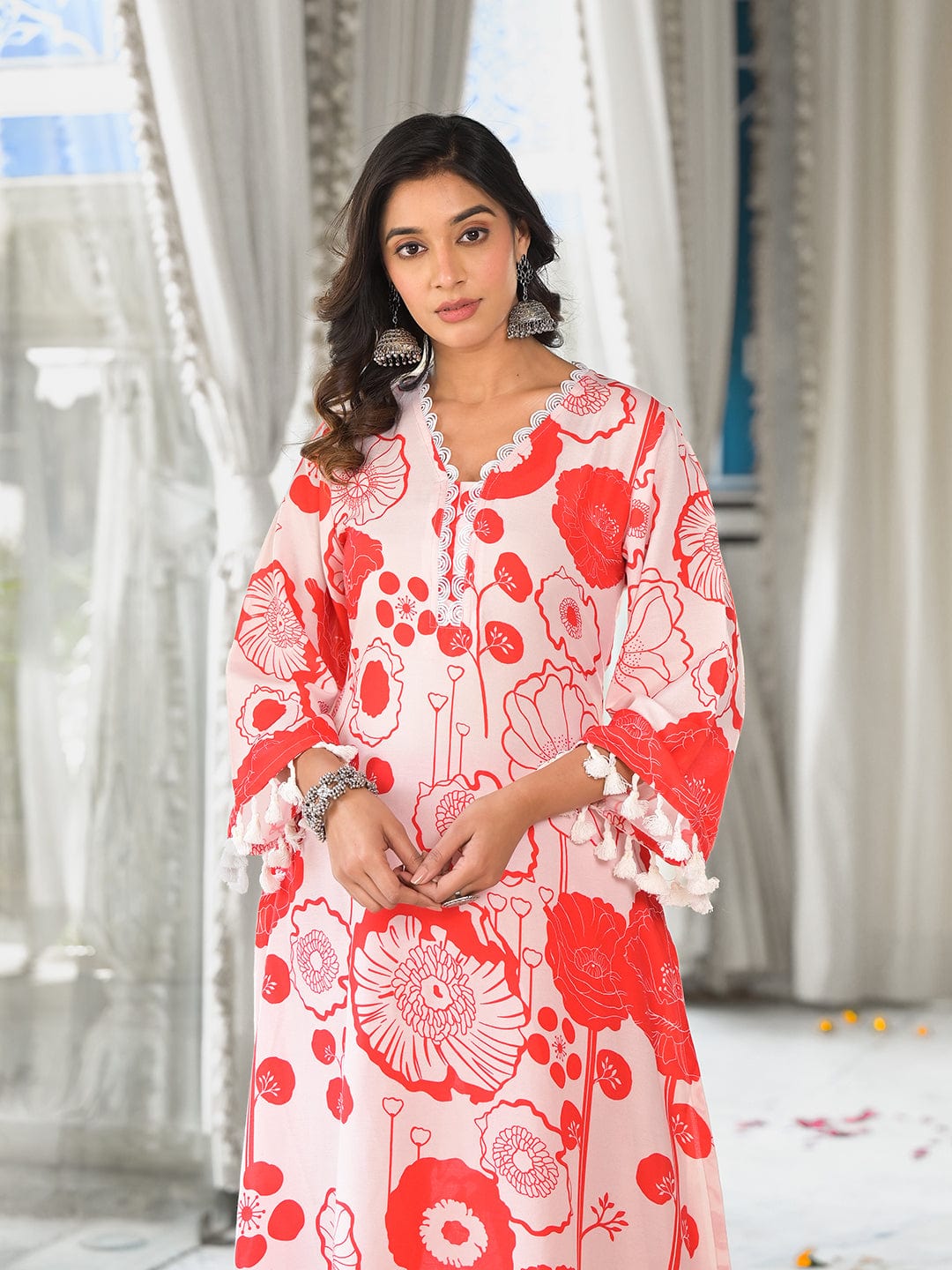 Varanga Women Peach Floral Printed V-Neck Straight Kurta With Tessels Hem Paired With Tonal Solid Bottom