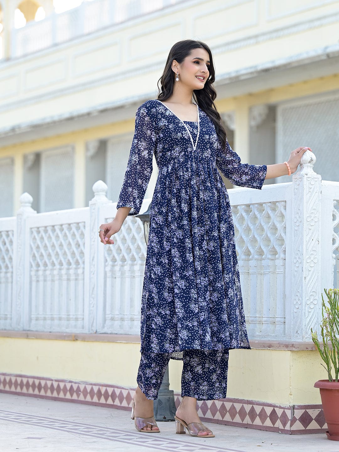 Varanga Women Navy Blue All over Floral Printed Pleated Empire Kurta Paired With Tonal Bottom