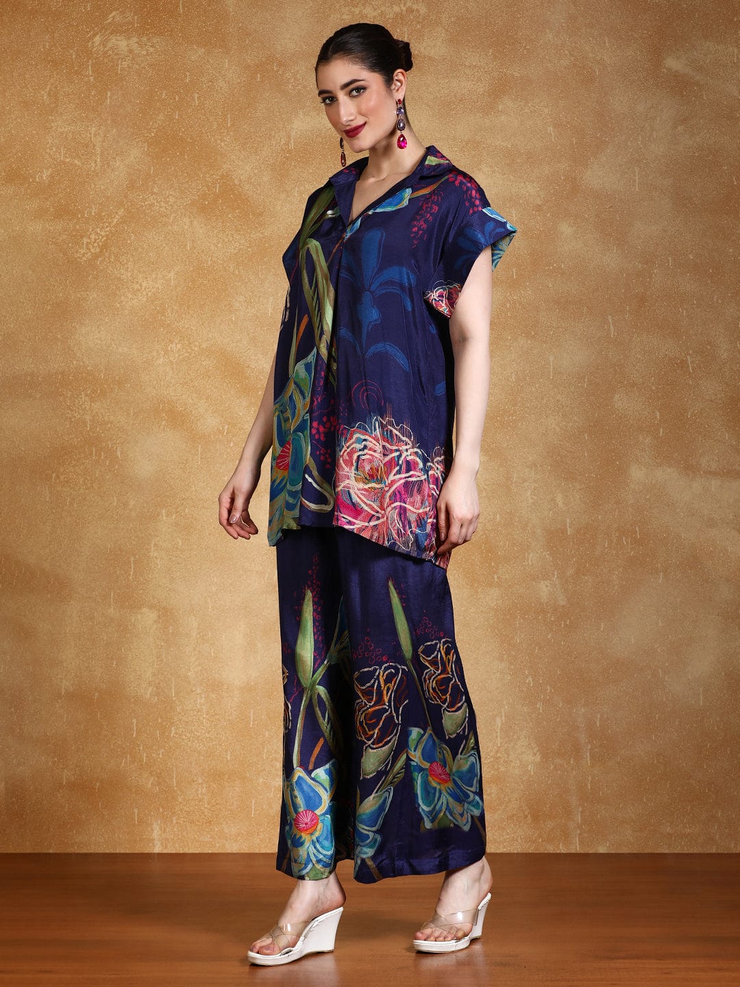 Bold floral printed loose fit top with flared palazzo
