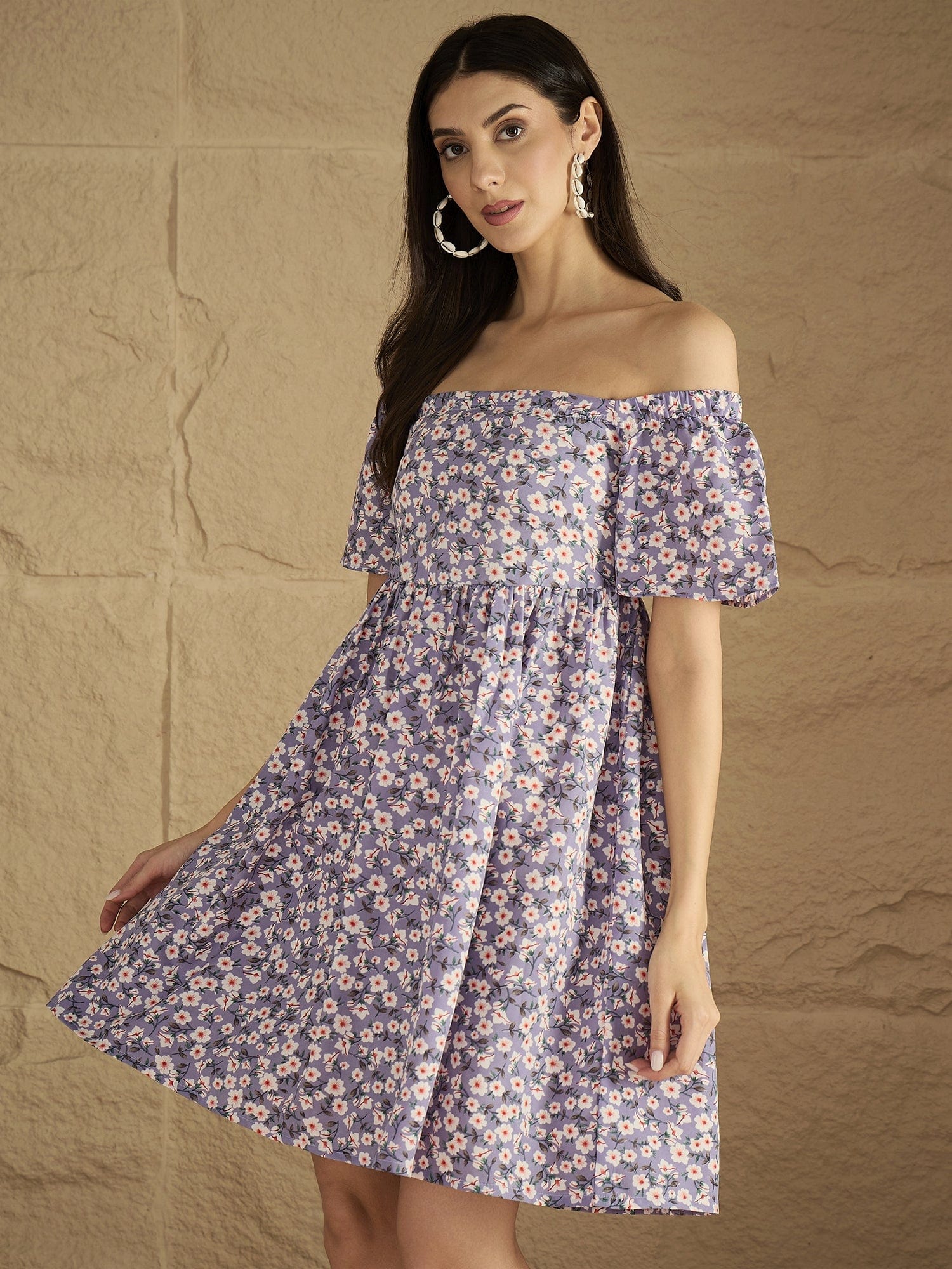 A Stunning Off-Shoulder Dress With Flared Sleeves .