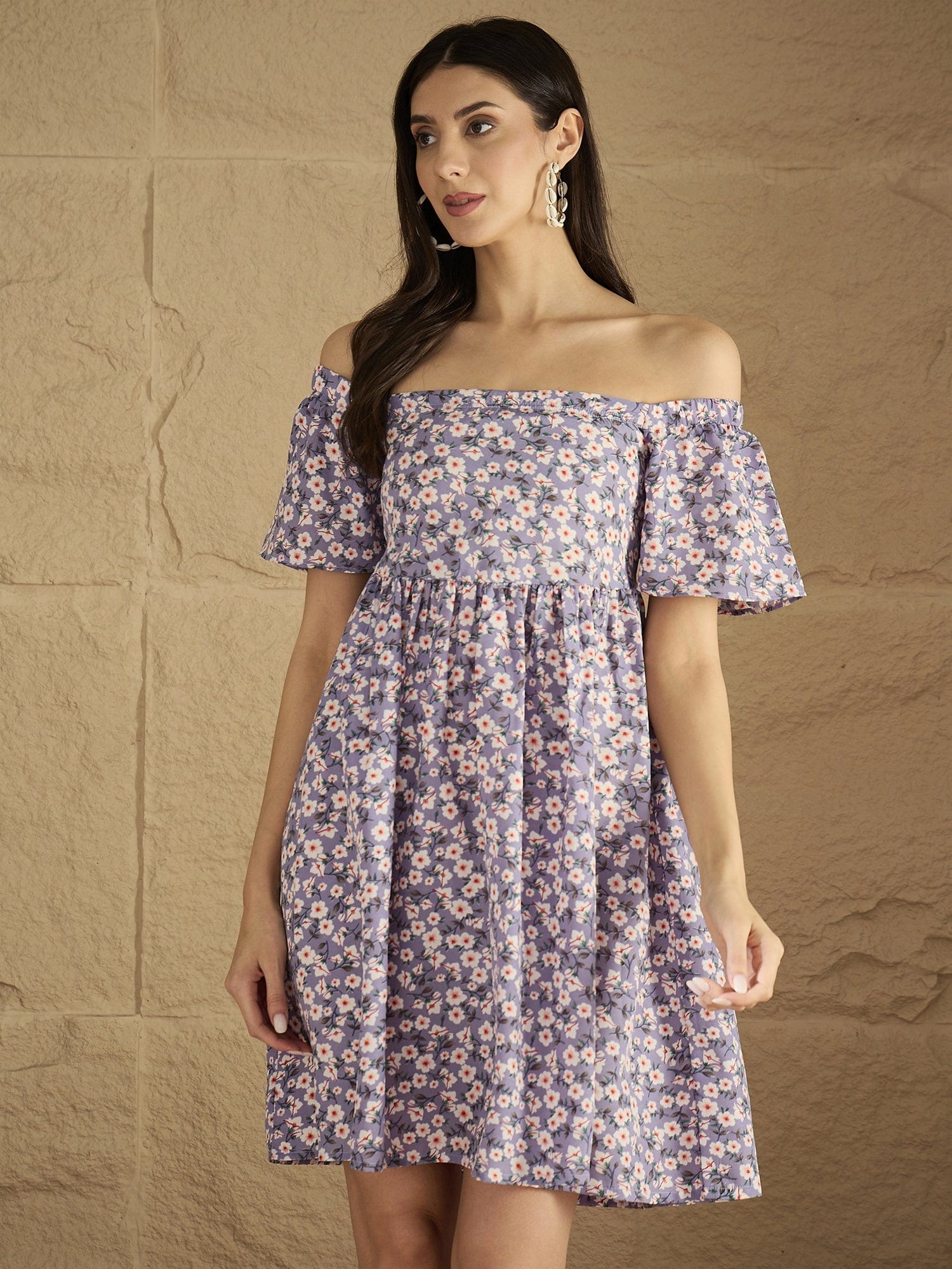 A Stunning Off-Shoulder Dress With Flared Sleeves .