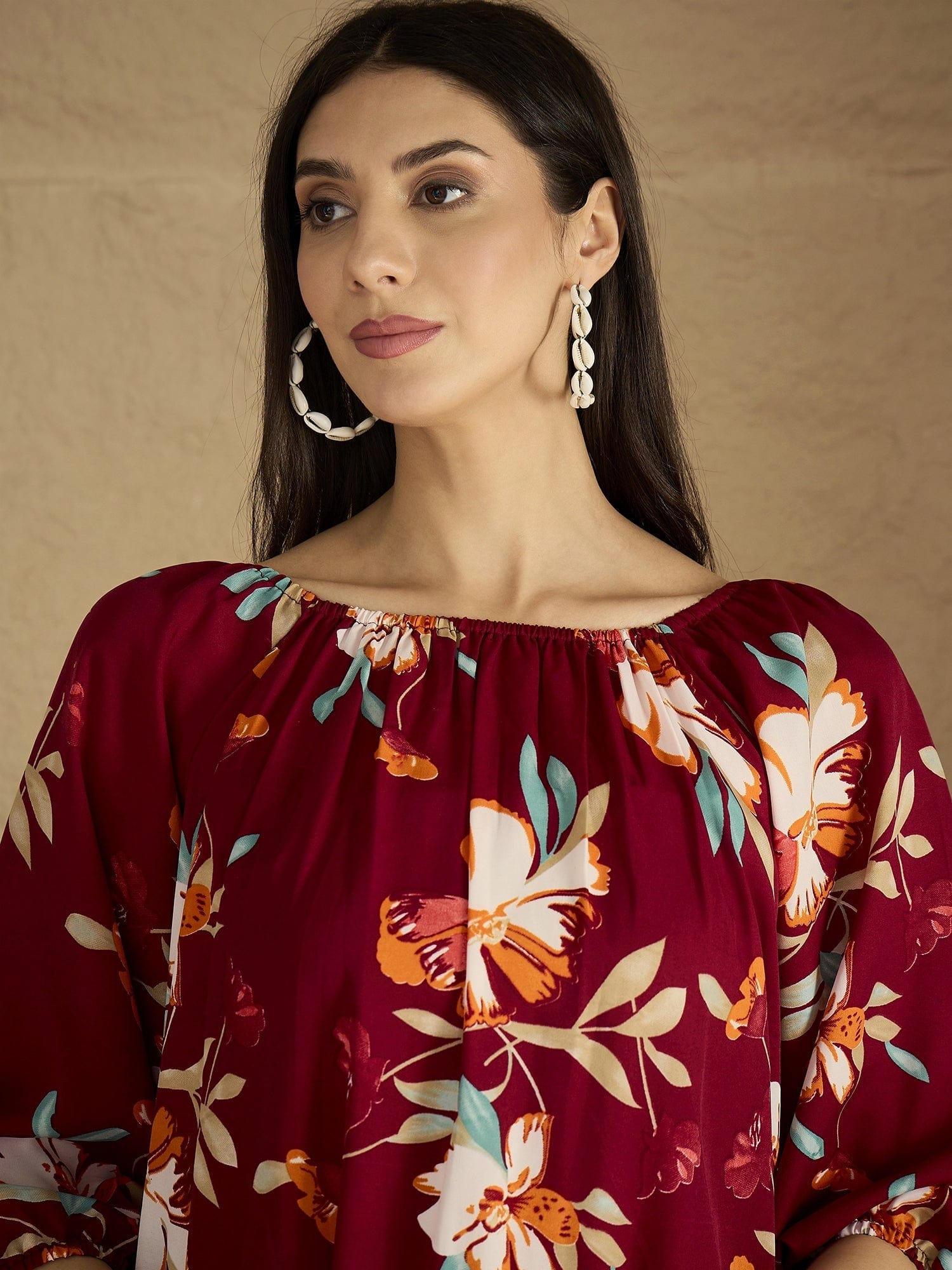 A Bold Floral-Printed Knee-Length Dress With An Elasticated Off-Shoulder Neckline And Balloon Sleeves Perfect For Turning Heads From Brunch To Evening Outings.