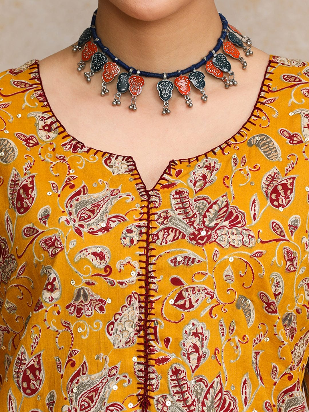 Ethnic Floral Printed With Tassel Detailing On Neck Straight Kurta