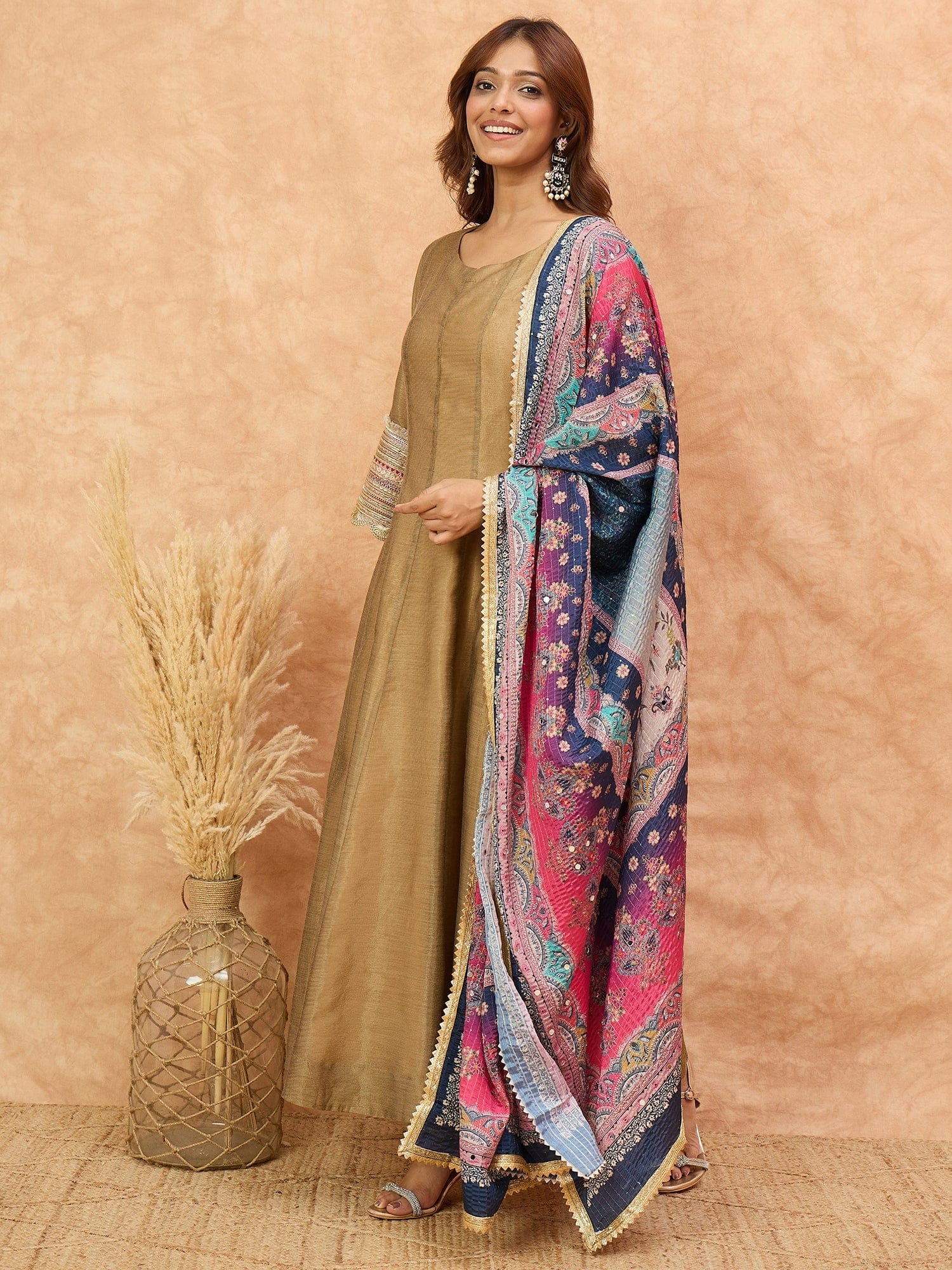 Varanga Women Shimmer Anarkali Featuring Lace-Detailed Sleeves And A Tasseled Dori at The Back Neck, Paired With a Printed Dupatta Embellished With Mirror .