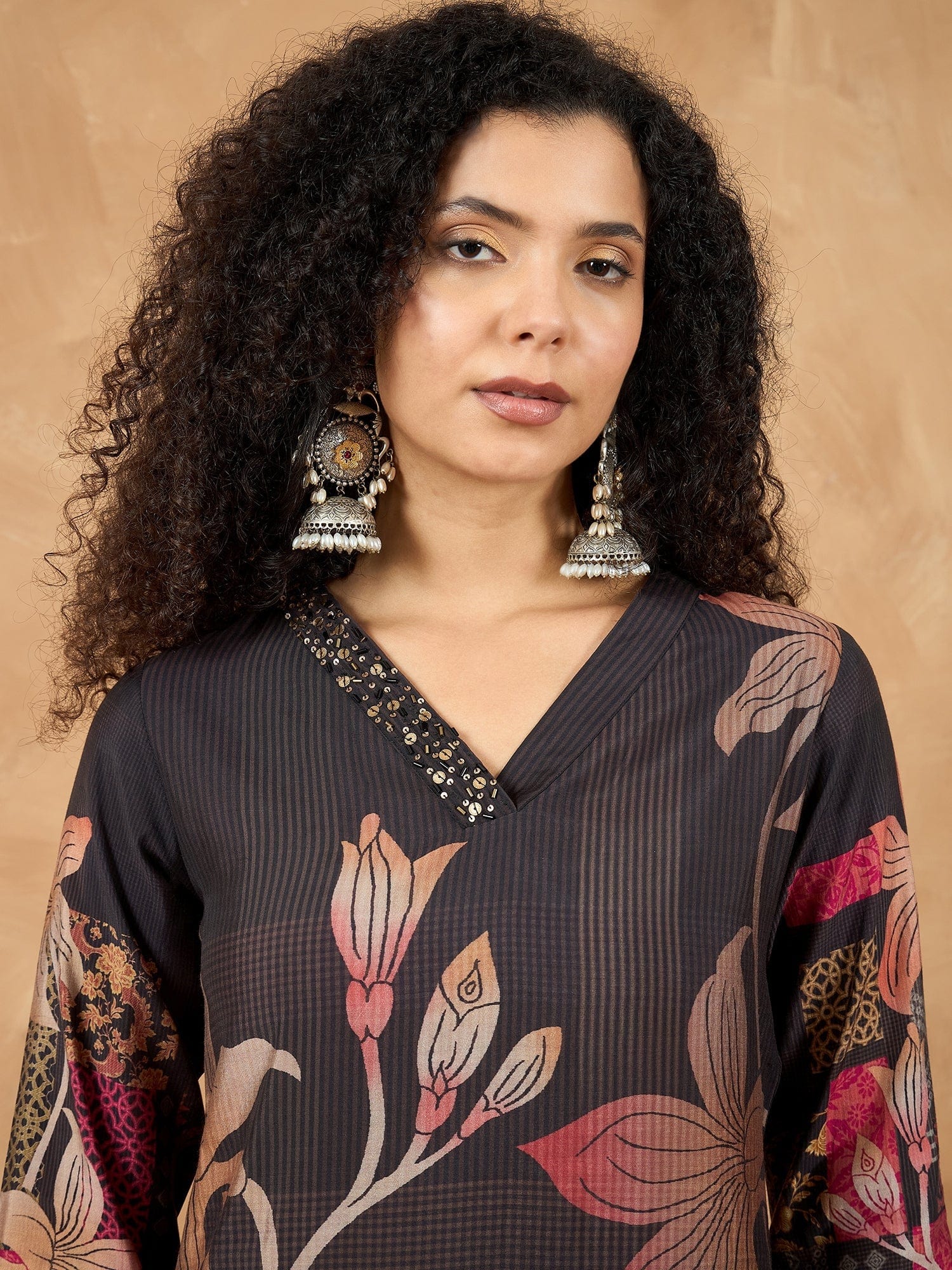 Varanga Women Floral Printed Kurta With Embellishment On One Side Of Neck And Sleeve Hem With Solid Trousers