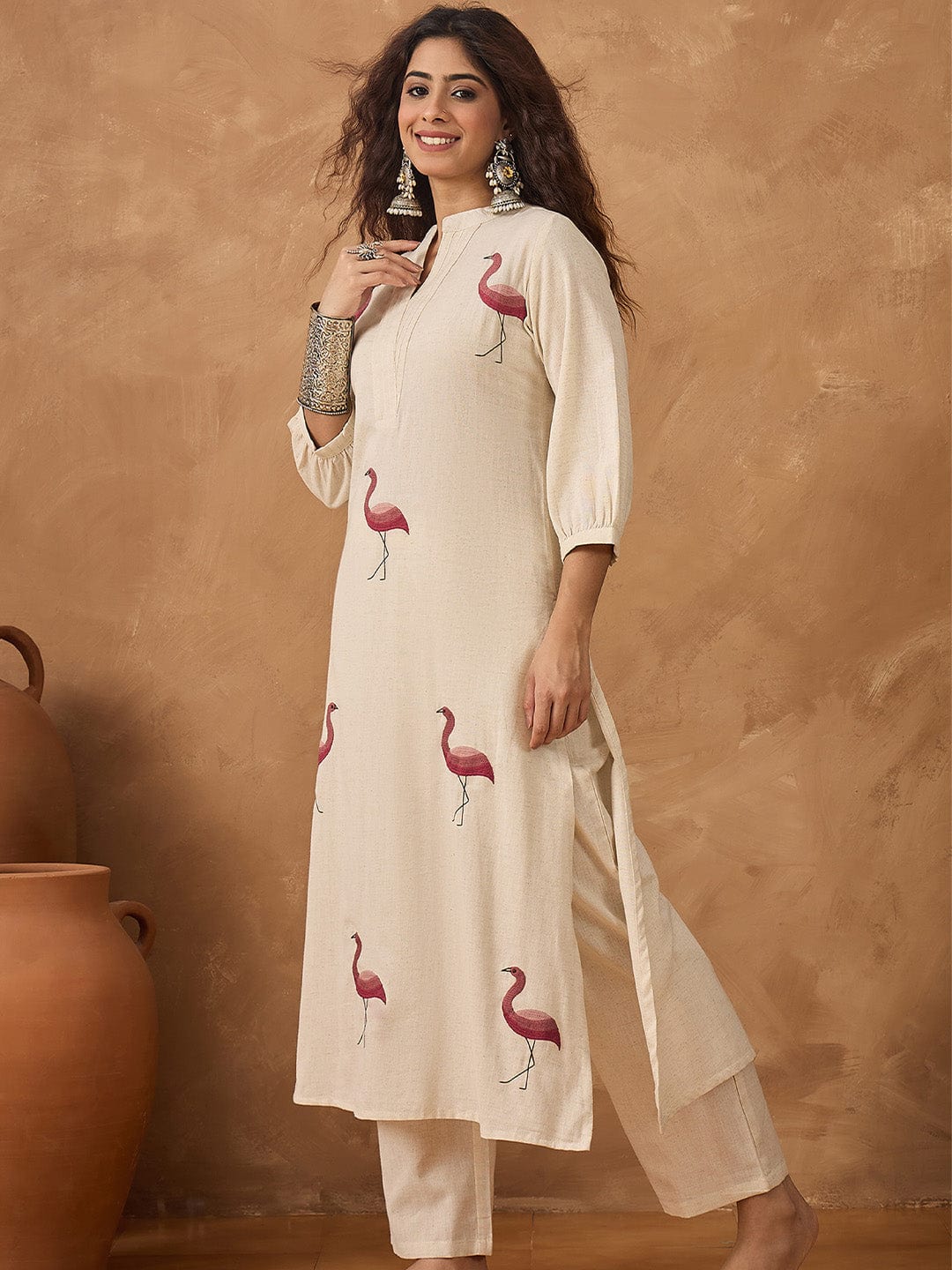Flamingo embroidered kurta paired with solid trousers