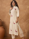 Flamingo embroidered kurta paired with solid trousers
