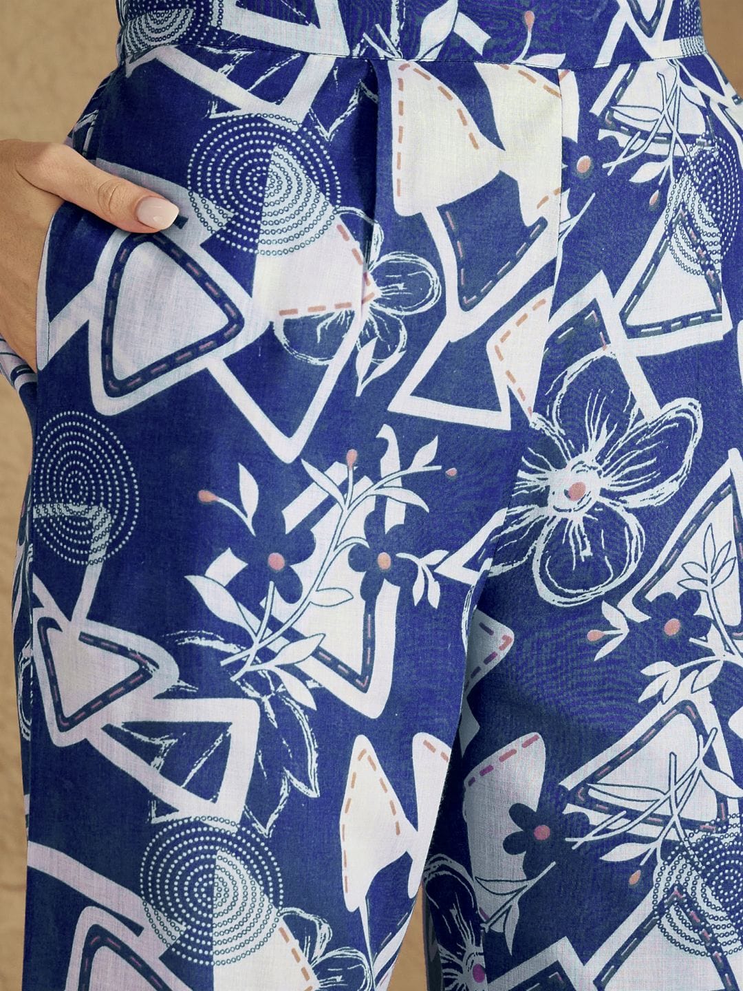 Blue and white printed straight kurta with a mandarin collar, paired with solid straight-fit trousers perfect for everyday elegance and comfort.