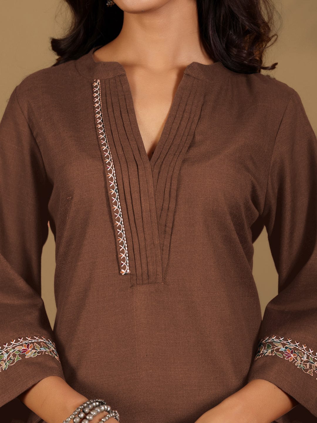 Varanga Women Brown Mandarin Collar Thread Embroidered With Pleate Deatialing Kurta Paired With Bottom