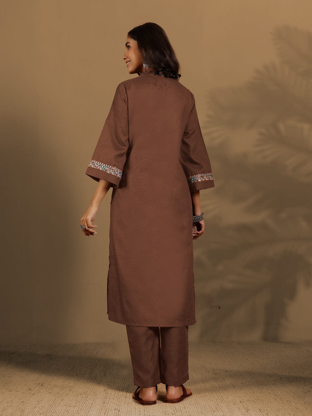 Varanga Women Brown Mandarin Collar Thread Embroidered With Pleate Deatialing Kurta Paired With Bottom