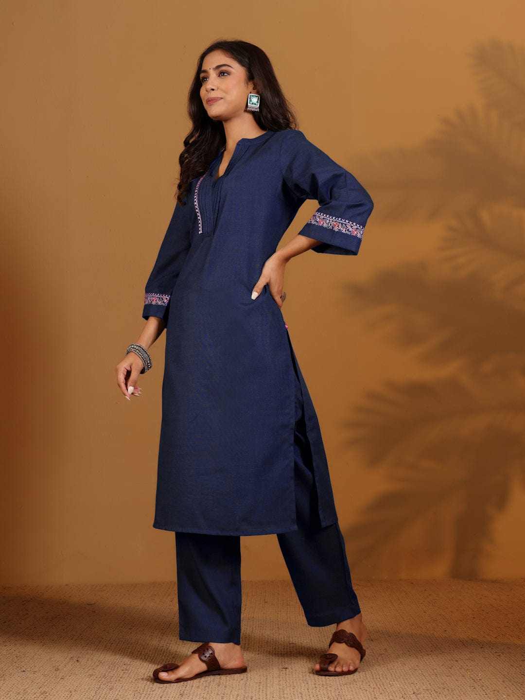 Varanga Women Blue Mandarin Collar Thread Embroidered With Pleate Deatialing Kurta Paired With Bottom