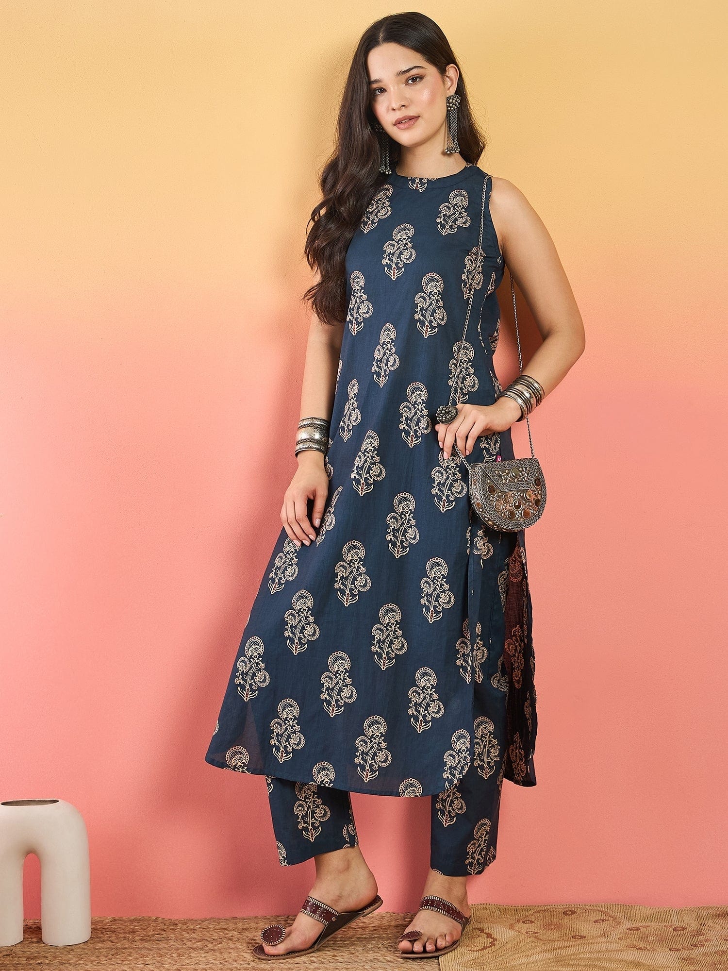 Varanga Blue Floral Printed Straight-Fit Kurta With Half Sleeves And Round Neck, Paired With Ankle-Length Printed Elasticated Trousers.