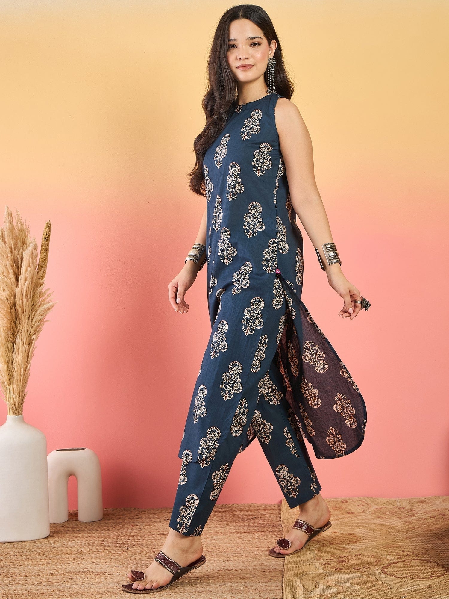 Varanga Blue Floral Printed Straight-Fit Kurta With Half Sleeves And Round Neck, Paired With Ankle-Length Printed Elasticated Trousers.