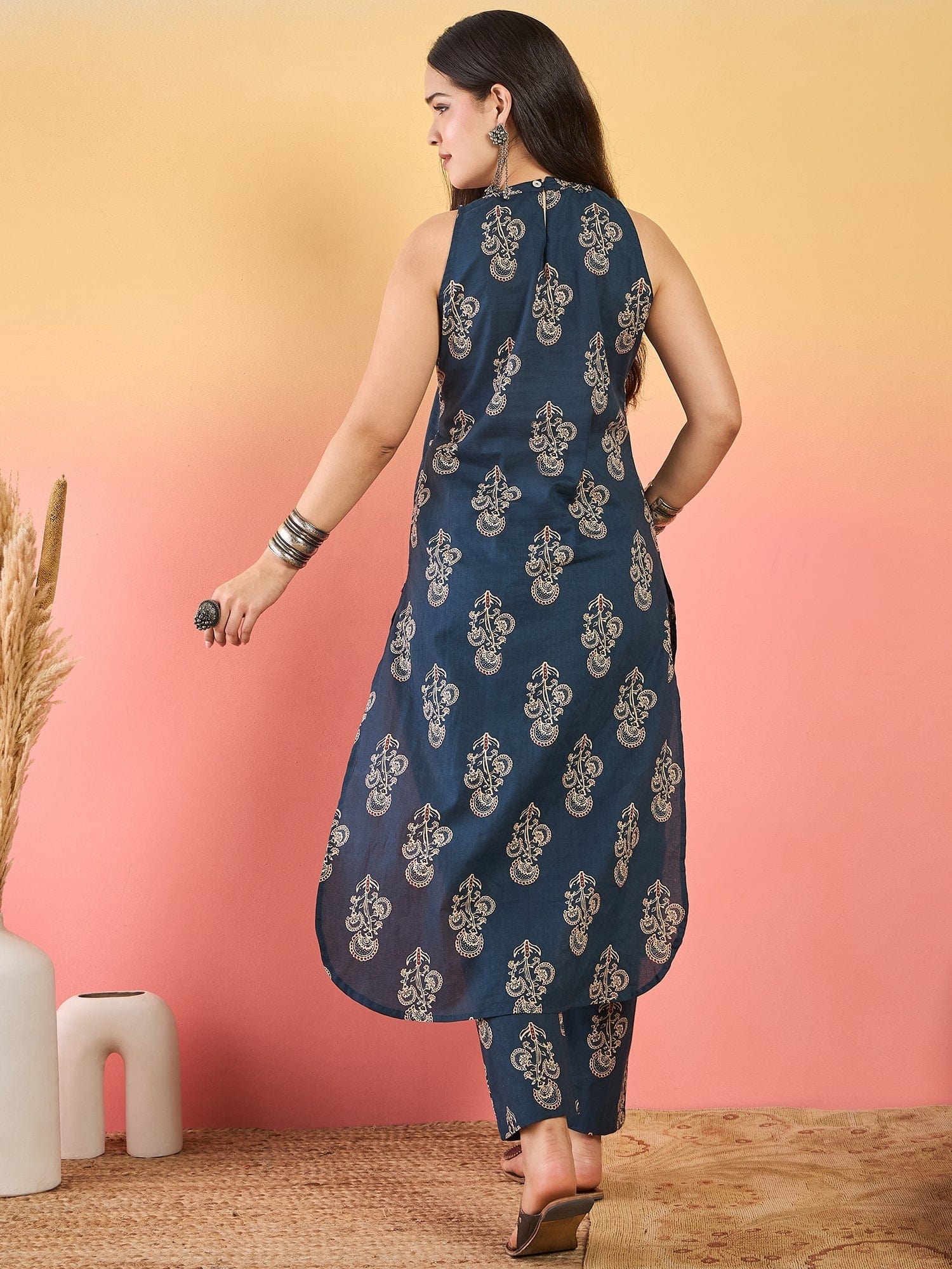 Varanga Blue Floral Printed Straight-Fit Kurta With Half Sleeves And Round Neck, Paired With Ankle-Length Printed Elasticated Trousers.
