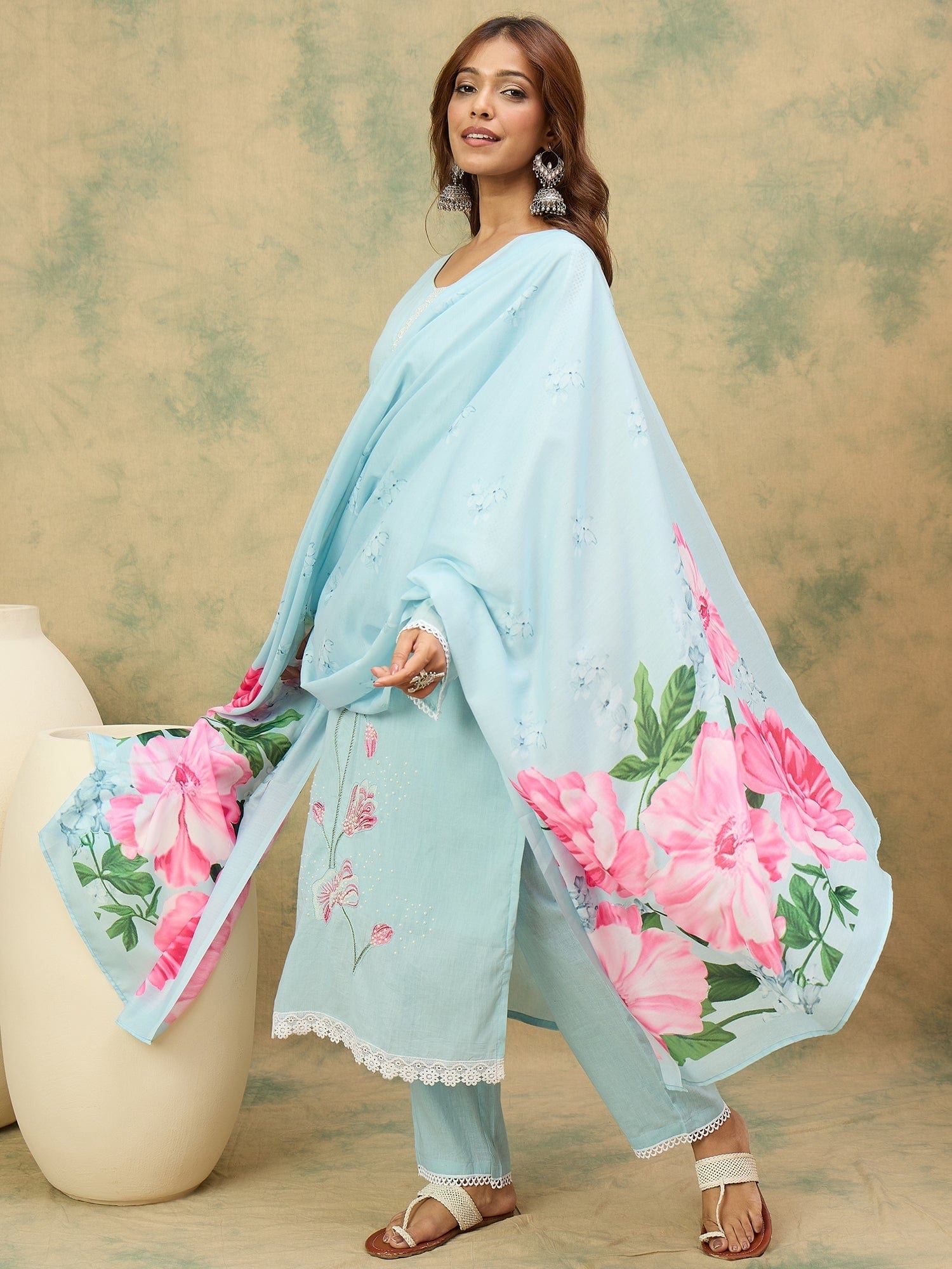 varanga Women A Graceful 3-Piece Set Featuring A Sky Blue Straight-Fit Kurta With Bell Sleeves, Solid Ankle-Length Trousers, And A Floral  Printed Dupatta For A Timeless Ethnic Look.