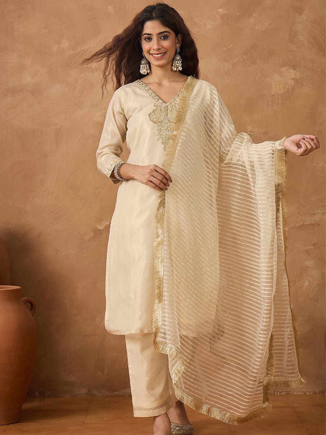 Shimmer Kurta with gold thread embroidery on neck paird with trousers and lurex dupatta