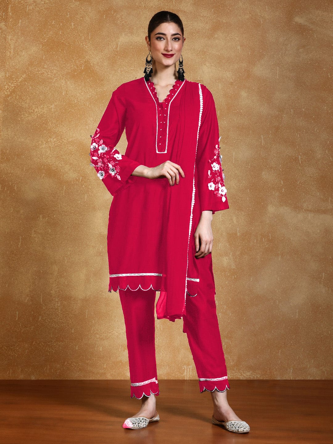 Varanga Women Kurta Set With 3D Work On The Sleeves Paired With Solid Trousers And Dupatta.