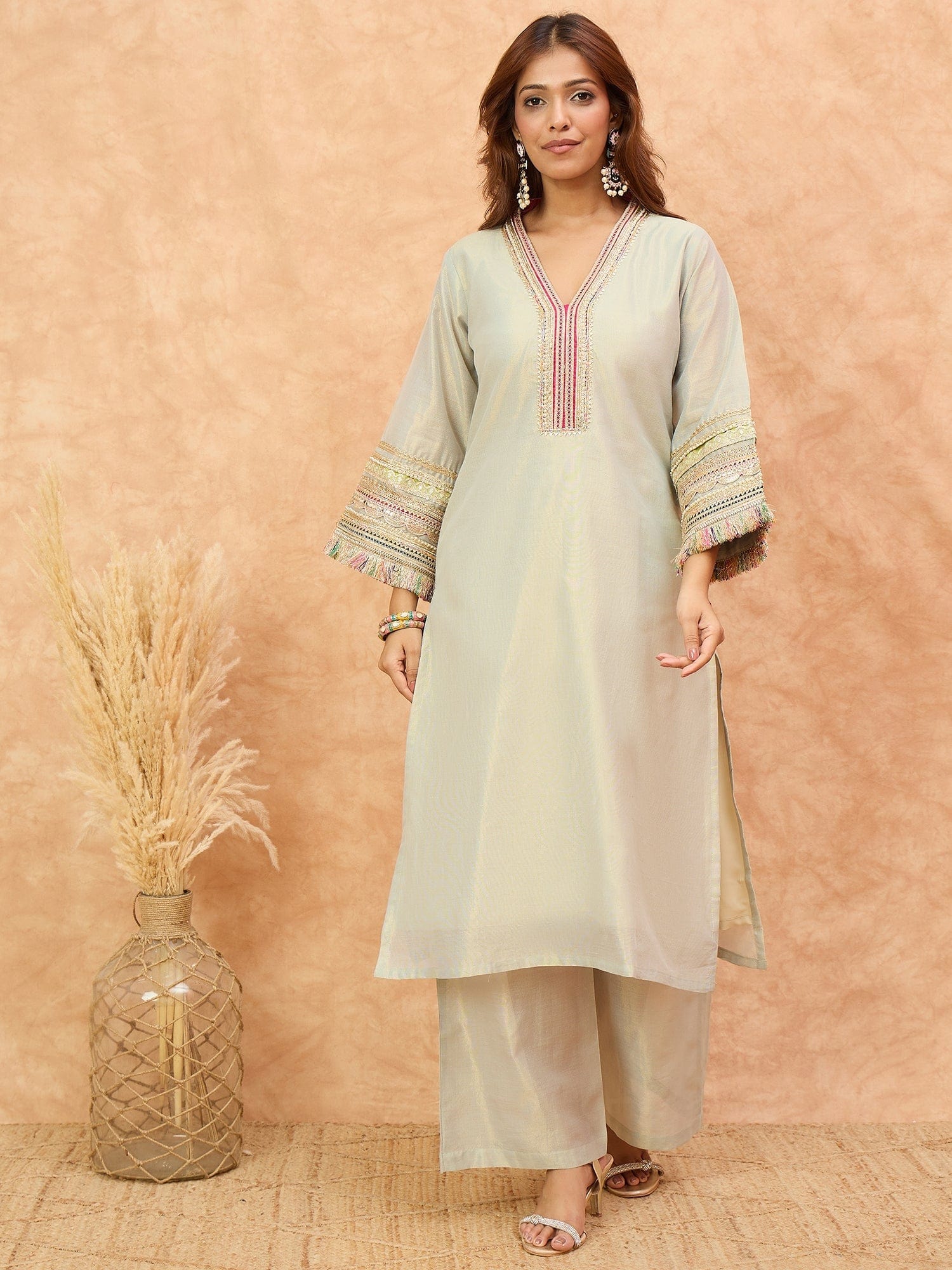varanga Women Shimmer Kurta Set Adorned With Delicate Zari Lace Detailing  Paired With Net Dupatta.
