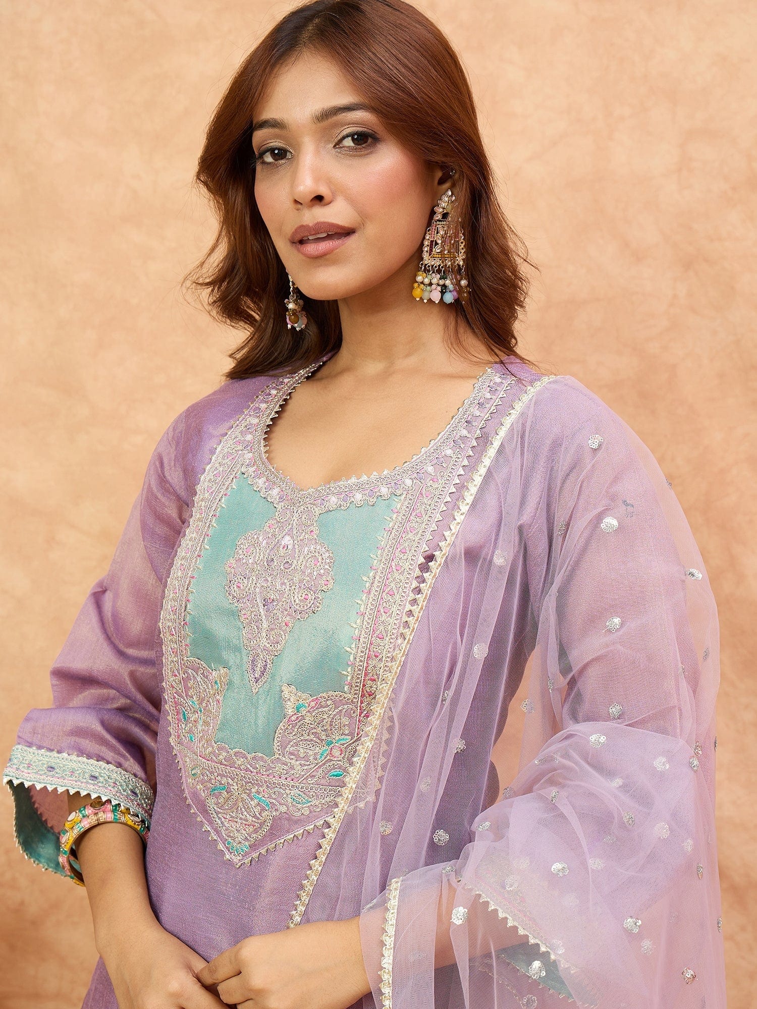 varanga Women Shimmer Kurta Set With Elegant Zari Embroidery, Paired With A Sequin-Detailed Net Dupatta.