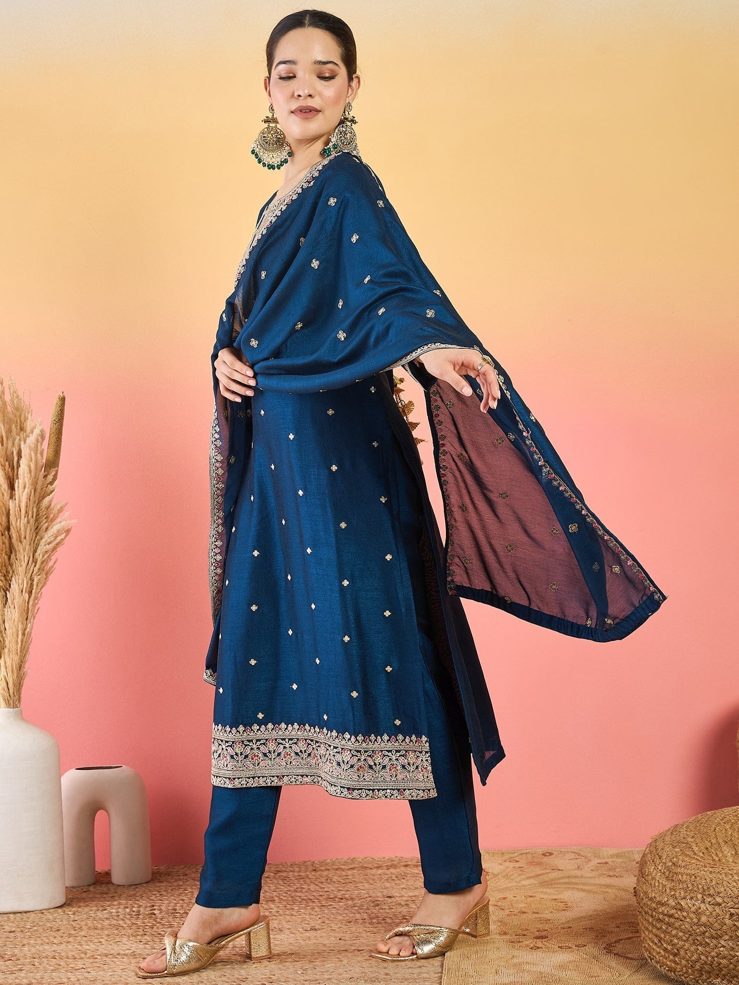 Varanga Kurta With Intricate Zari-Embroidered Yoke Is Paired With Ankle-Length Solid Trousers And A Matching Zari-Accented Dupatta