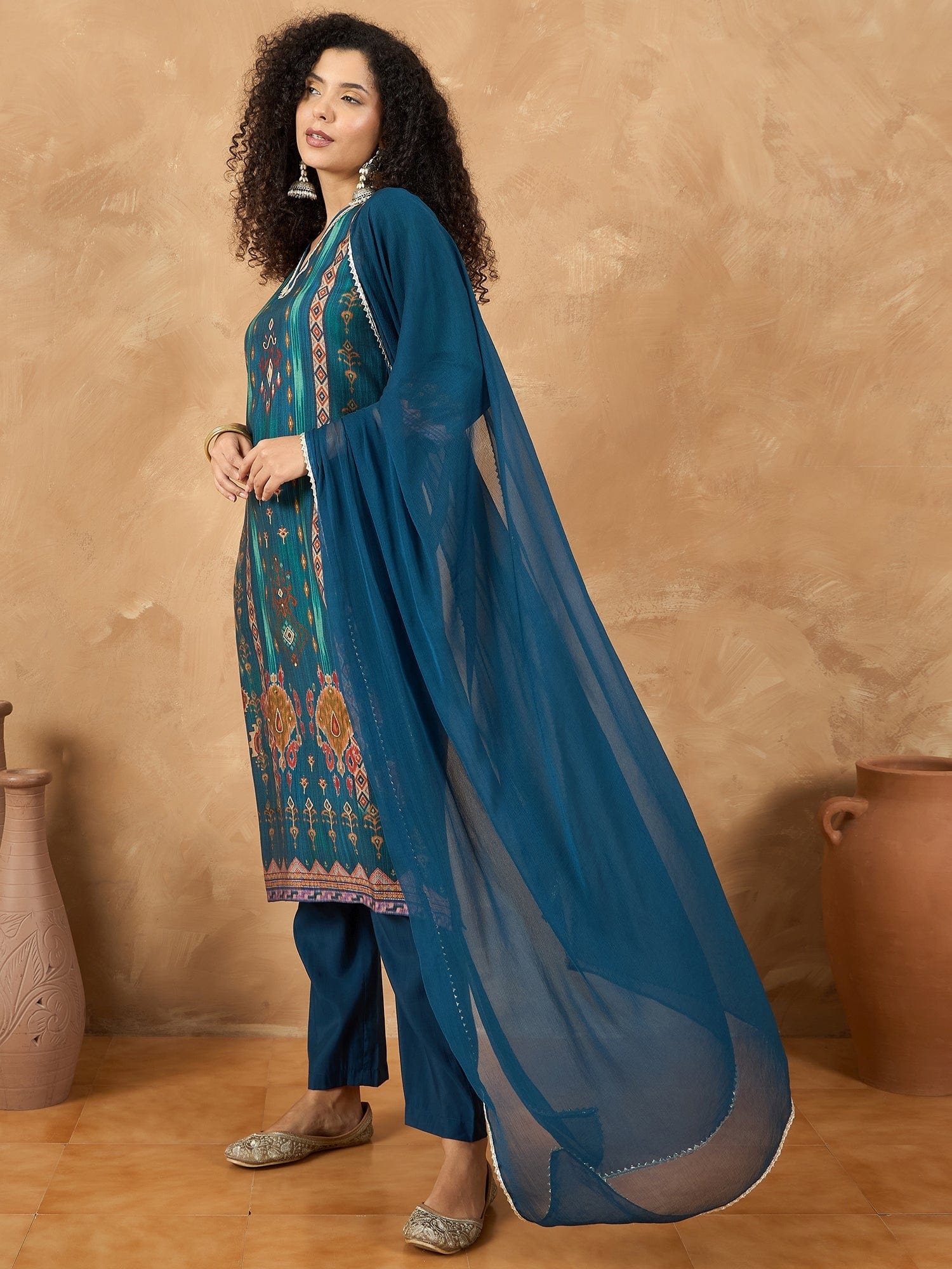 varanga Women A Vibrant 3-Piece Blue Ikat-Printed Kurta Set With Solid Trousers And A Lace-Trimmed Dupatta (Perfect For Festive Occasions, Styled Best With Jhumkas, Juttis, And Soft Glam Makeup.)