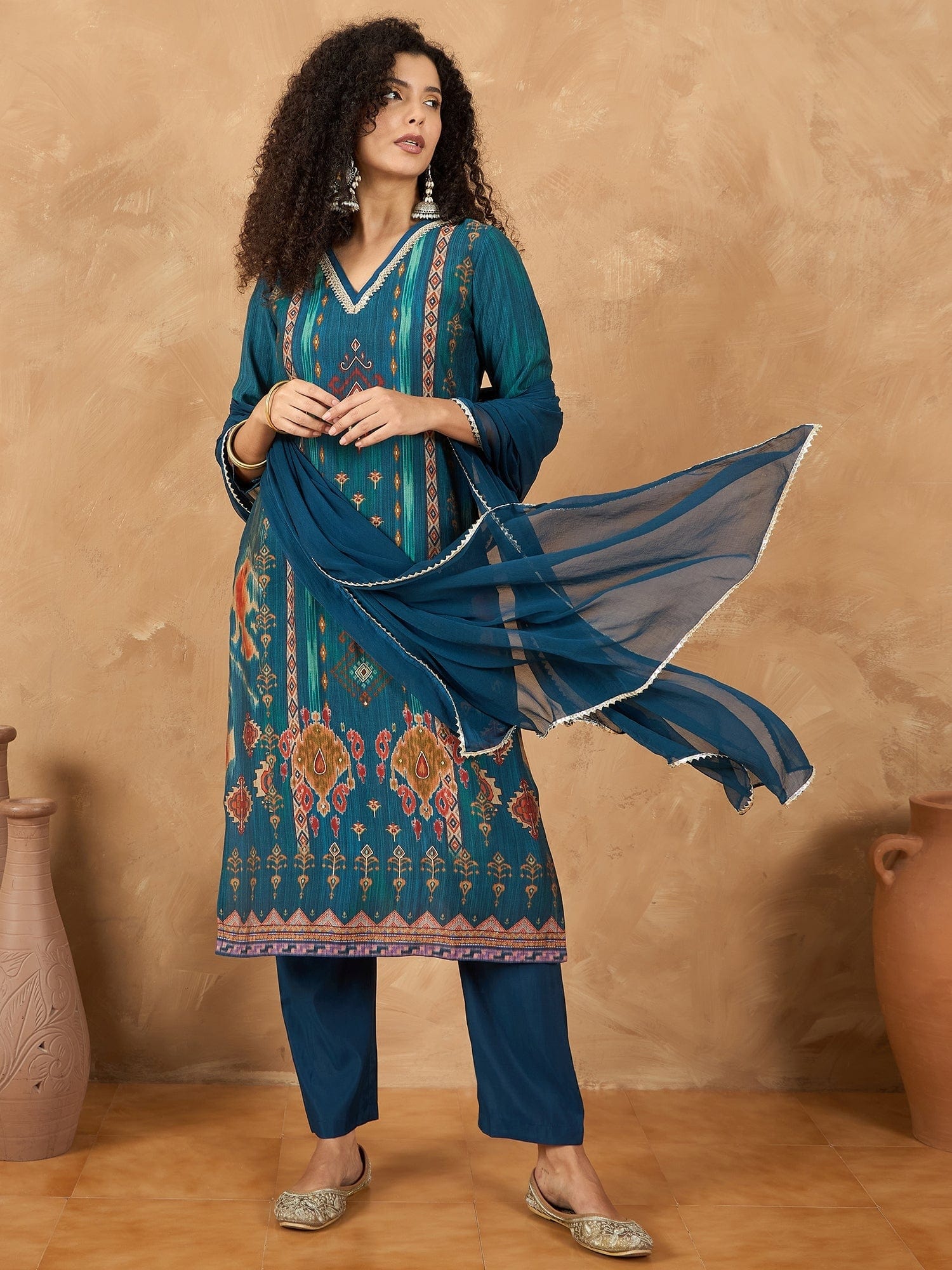 varanga Women A Vibrant 3-Piece Blue Ikat-Printed Kurta Set With Solid Trousers And A Lace-Trimmed Dupatta (Perfect For Festive Occasions, Styled Best With Jhumkas, Juttis, And Soft Glam Makeup.)