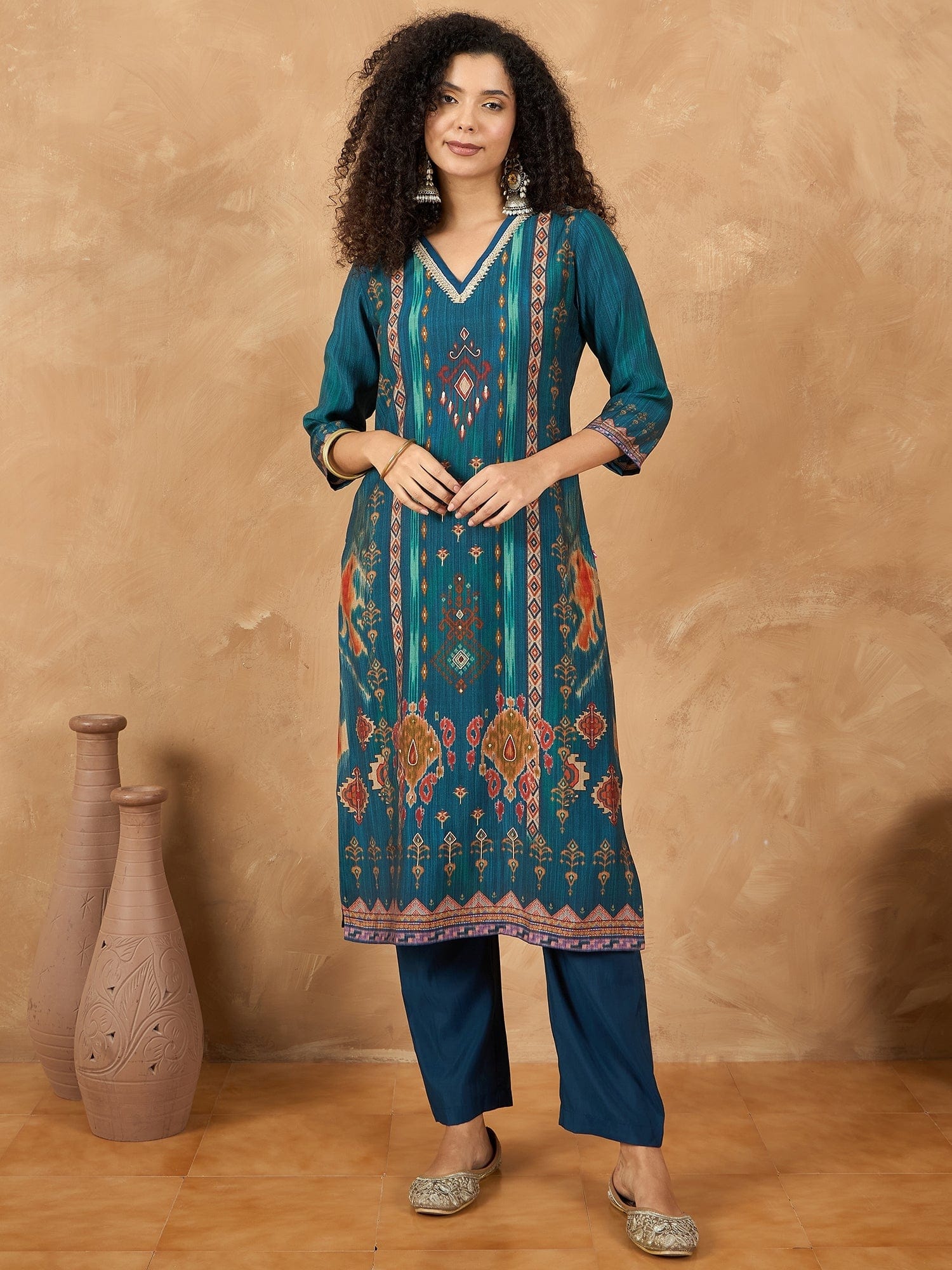 varanga Women A Vibrant 3-Piece Blue Ikat-Printed Kurta Set With Solid Trousers And A Lace-Trimmed Dupatta (Perfect For Festive Occasions, Styled Best With Jhumkas, Juttis, And Soft Glam Makeup.)