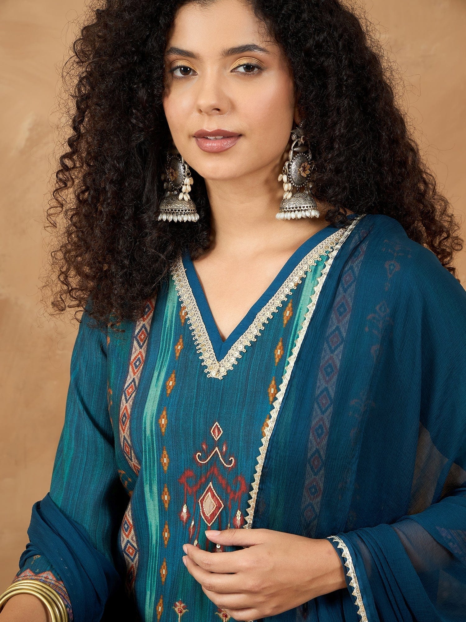 varanga Women A Vibrant 3-Piece Blue Ikat-Printed Kurta Set With Solid Trousers And A Lace-Trimmed Dupatta (Perfect For Festive Occasions, Styled Best With Jhumkas, Juttis, And Soft Glam Makeup.)