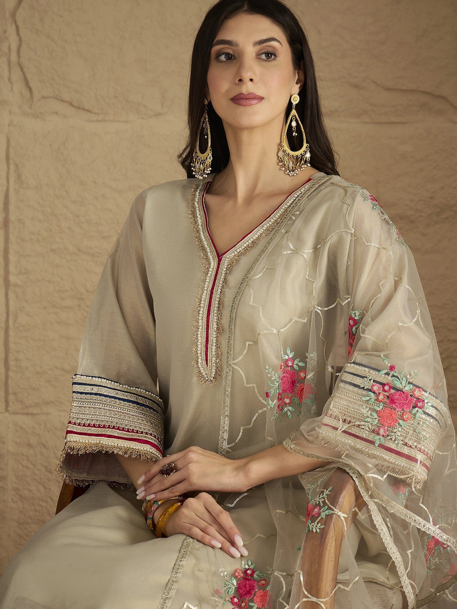 Varanga Women Elegant Three-Piece Set Featuring A Shimmer-Detailed Grey Kurta, Solid Ankle-Length Trousers, And An Embroidered Net Dupatta Perfect For Festive Occasions.