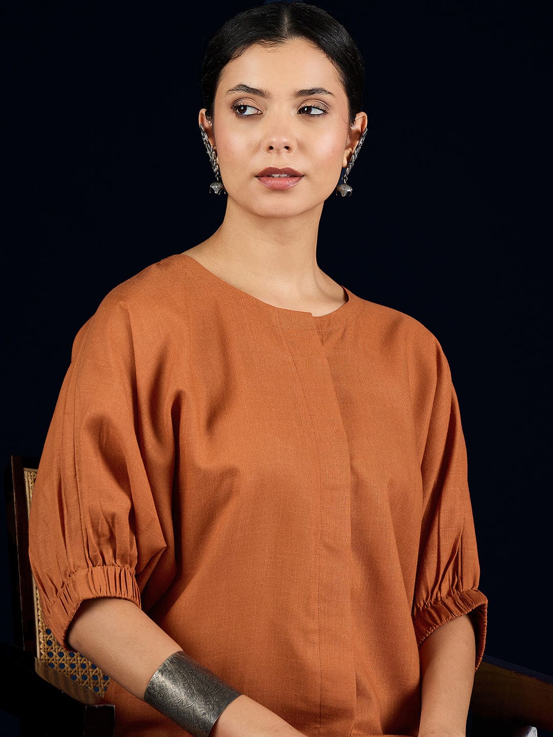 Varanga Rust Straight-Fit Shirt With Puff Sleeves And A Round Neck, Paired With Solid Ankle-Length Straight-Fit Trousers.