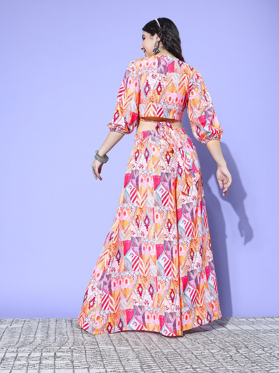 Multi Colour Abstract Printed Wrap Top Paired With Tonal Printed Flared Bottom