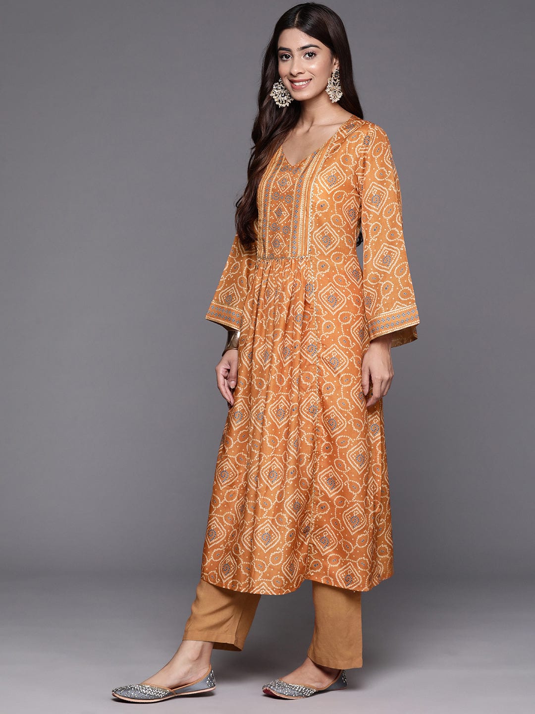 Rust Bandhani Printed Embellished With Gota A-Line Kurta Paired With Tonal Solid Bottom And Tonal Chiffon Dupatta