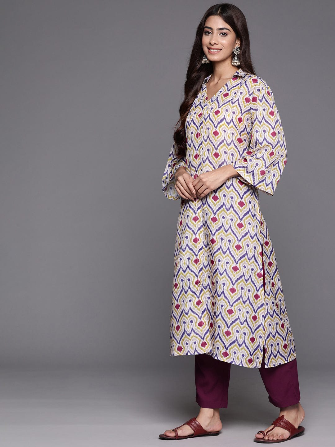Off White Ikat Printed Shirt Collar Straight Kurta Paired With Violet Solid Bottom.