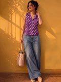A Chic Sleeveless Printed Top With A Collared V-Neck Design, Perfect For Effortless Casual And Summer Styling.