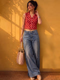 A Chic Sleeveless Printed Top With A Collared V-Neck Design, Perfect For Effortless Casual And Summer Styling.