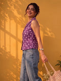 A Chic Sleeveless Printed Top With A Collared V-Neck Design, Perfect For Effortless Casual And Summer Styling.