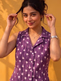 A Chic Sleeveless Printed Top With A Collared V-Neck Design, Perfect For Effortless Casual And Summer Styling.