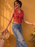 A Chic Sleeveless Printed Top With A Collared V-Neck Design, Perfect For Effortless Casual And Summer Styling.